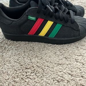 brand new never worn Addidas. they’re a boys size which fit my size 8.